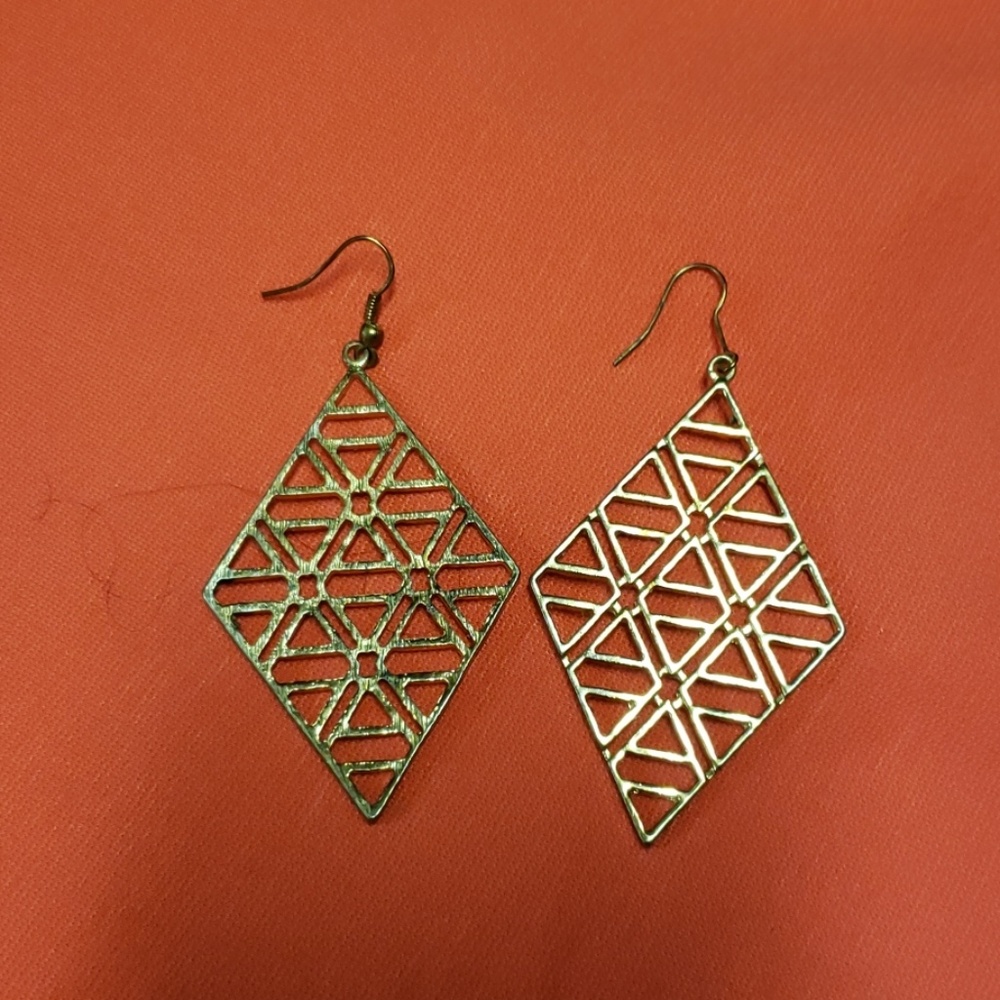 Cute gold tone statement earrings